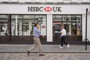 HSBC reports annual profit decline while exceeding analyst expectations
